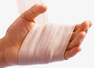 Hand Being Bandaged As Injury